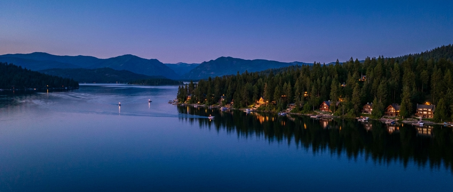 Lake Coeur d'Alene at twilight — luxury waterfront segment